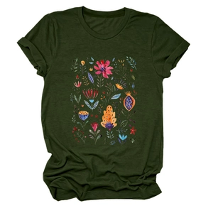 Detail of olive green tee showing textured fabric and colorful floral folk art pattern