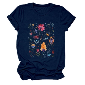 Detailed view of floral folk art print on navy blue crew neck short sleeve t-shirt