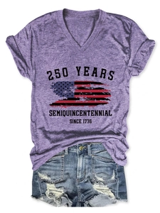 Detail of V-neck T-shirt with 250 years graphic and distressed denim shorts set
