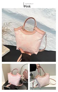 Detailed pink silk embroidered tote bag featuring floral patterns and detachable shoulder strap
