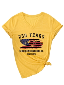 Detail of yellow V-neck tee with 250 years semiquincentennial print and side-tied knot