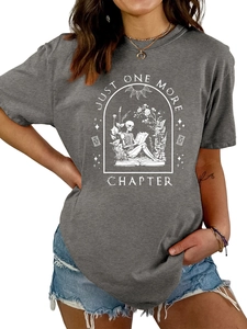 Detailed close-up of retro skeleton reading graphic on charcoal grey crew neck t-shirt