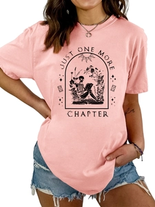 Detail of pink cotton T-shirt featuring gothic skeleton reading book graphic and text