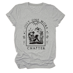 Detail of Just One More Chapter graphic print with skeleton reading on grey cotton t-shirt