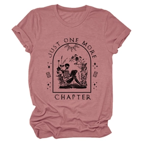 Detail of dark academia skeleton reading graphic on dusty pink cotton t-shirt