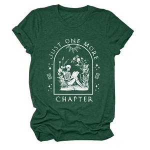 Close-up of skeleton reading illustration on dark green cotton t-shirt with white graphic