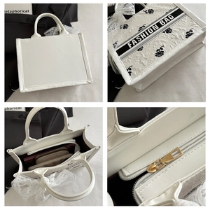 Detail view of white tote bag featuring black rose pattern and lace bow decoration