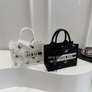 Fashion tote bags with rose jacquard, lace bows, and stylish ribbon handle details