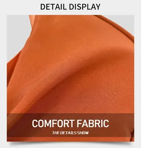 Close-up of bright orange nylon fabric showing fine twill texture and durable material