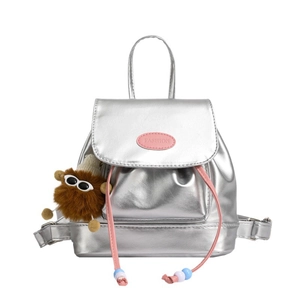 Chic silver metallic backpack with pink drawstrings and fashionable plush monster charm