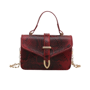Red snakeskin pattern crossbody handbag with golden U-shaped buckle and chain strap