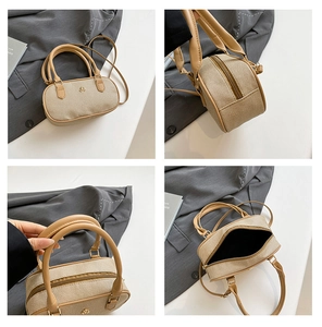 Detail view of retro patchwork handbag with linen texture and leather trim finish