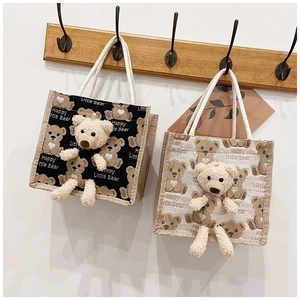 Minimalist canvas tote bags with cute bear prints and 3D plush doll decorations