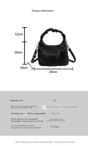 Detailed view of black pleated PU handbag showing vertical texture and cloud-style handle