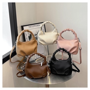 Detailed display of five ruched PU leather handbags in black, brown, white and pink colors