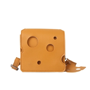 Creative yellow cheese-shaped mini crossbody bag with unique cutout hole design