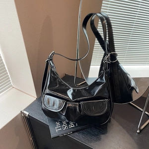 Retro black patent leather hobo shoulder bag with double front pockets and silver buckles