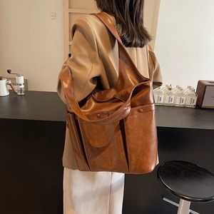 Brown vintage large capacity faux leather tote bag with side pocket for daily commute
