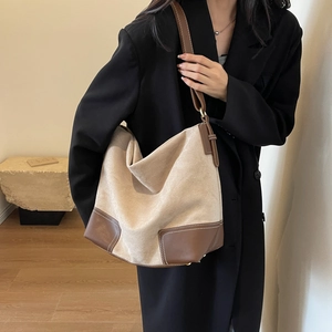 Retro large capacity beige canvas and brown leather tote bag with contrast stitching