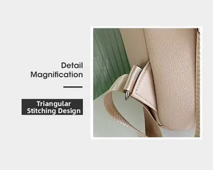 Detail of triangular bartack stitching and gold hardware on beige pebble leather backpack