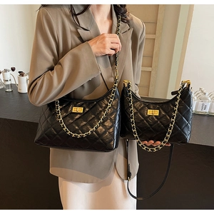 Detailed comparison of large and small quilted tote bags with gold chain straps