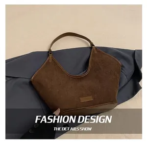 Detail of vintage coffee corduroy tote bag with brown leather trim and large capacity