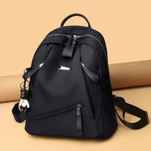 Women's minimalist black large capacity backpack with cute bear pendant and zippers
