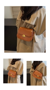 Detailed back view of caramel leather square shoulder bag with gold metal buckle