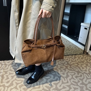 Large dark brown matte leather tote bag with long shoulder straps for women commuting