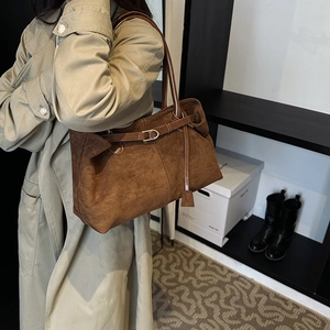 Deep brown frosted tote bag with minimalist retro design and elegant metallic buckle