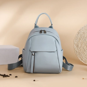 Light blue lychee texture leather backpack for women with adjustable straps and multi-pockets