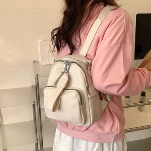 Chic off-white mini backpack for women in pebbled PU leather with silver hardware
