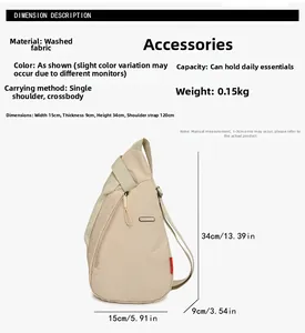 Vue détaillée du sac bandoulière beige en tissu délavé avec dimensions 34x15x9cm