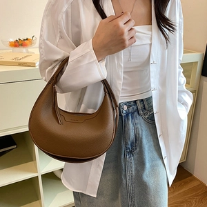 Brown lychee leather half-moon shoulder bag with minimalist top handle for women
