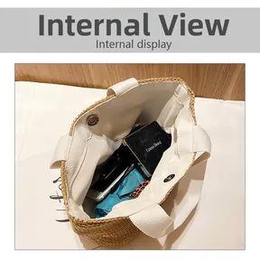 Macro view of woven straw tote bag interior with magnetic clasp and spacious canvas lining