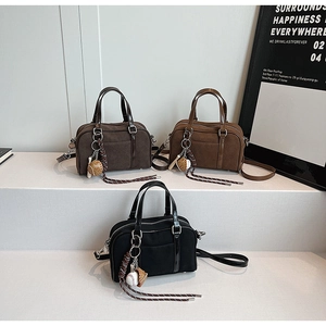 Three retro frosted Boston bags in black, dark brown, and khaki with baseball pendants