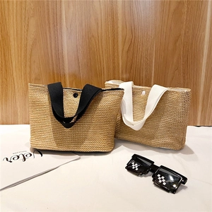 Minimalist woven straw tote bags with canvas straps for summer beach vacations