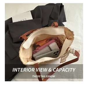 Top view showing large capacity of straw woven tote bag with brown leather handles
