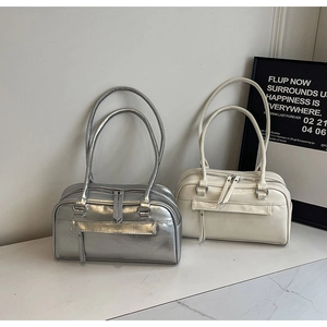 Detailed comparison of silver metallic and cream white matte rectangle shoulder bags
