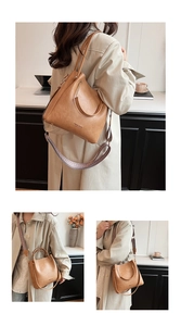 Close-up of caramel brown bucket bag with dual straps and DINALISHA logo detail