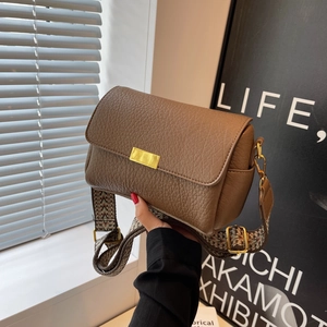 Vintage brown lychee leather crossbody bag with ethnic wide strap and gold buckle
