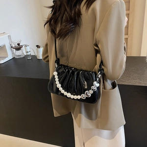 Chic black pleated cloud bag with pearl heart chain and long shoulder strap for women