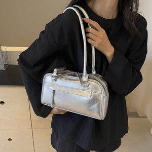 Silver metallic rectangular shoulder bag with dual straps and glossy faux leather texture