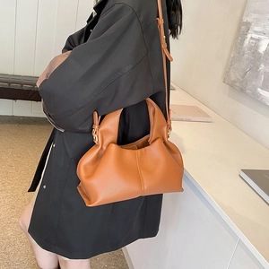 Caramel minimalist cloud handbag with lychee texture leather and adjustable shoulder strap