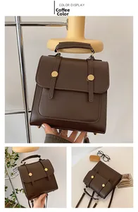 Macro detail of dark brown vintage faux leather backpack with metallic buckles