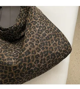 Detail of soft leopard print canvas fabric with high-quality texture and durable weave