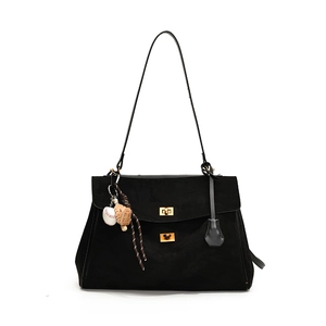 Black matte tote bag with long strap and baseball charm in a classic casual design
