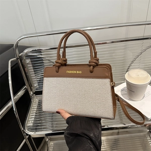Vintage-style color-block square handbag with ivory canvas and brown leather trim