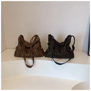 Detailed comparison of brown and dark coffee leopard print tote bags with knot straps