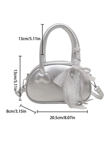Silver faux leather crossbody handbag with large white lace bow and 20.5cm width measurement